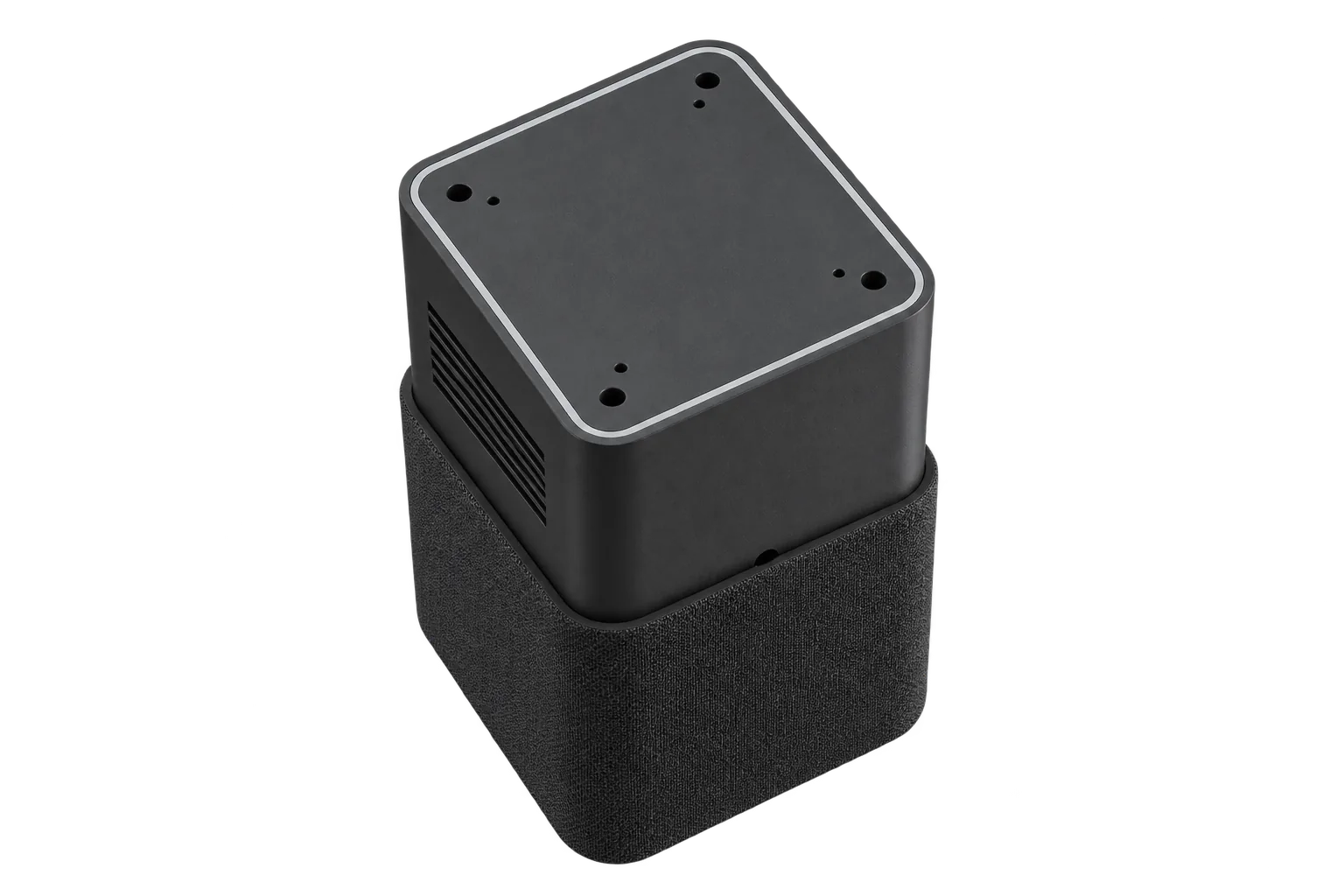 Nolaka Station from above, showing its rounded square top, light ring and matte shell.
