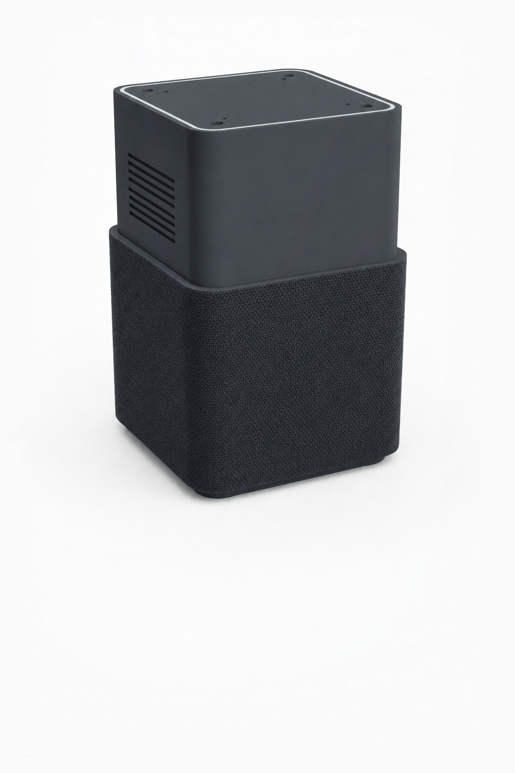 Nolaka Station concept: a compact charcoal enclosure with side vents and a dark acoustic knit base.